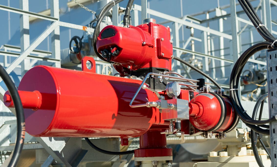 Emergency valve on gas equipment with a red actuator